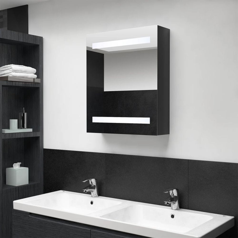 Vidaxl LED kúpeľňová zrkadlová skrinka žiarivá čierna 50x14x60 cm