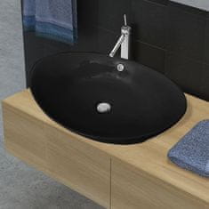 Petromila vidaXL Čierne luxusné keramické umývadlo oválne s prepadom 59 x 38,5 cm
