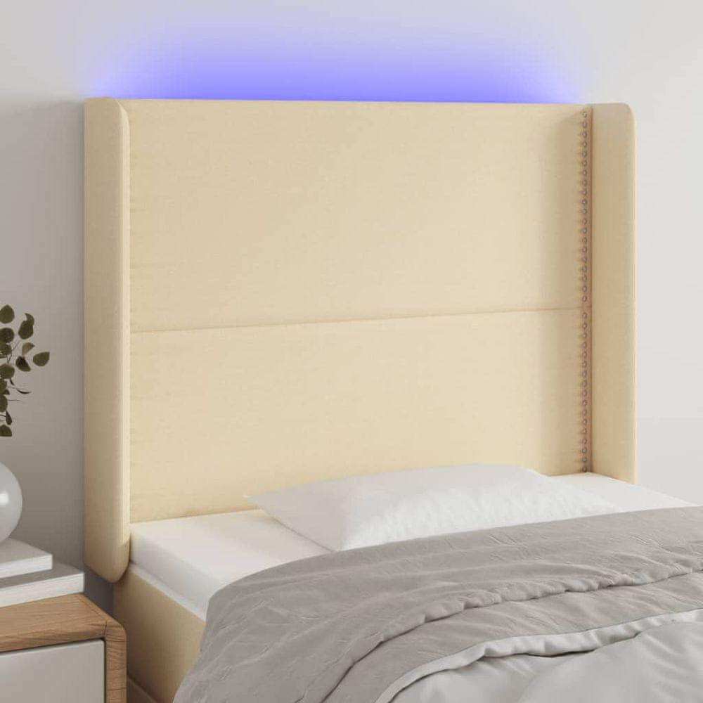Vidaxl Čelo postele s LED krémové 83x16x118/128 cm látka