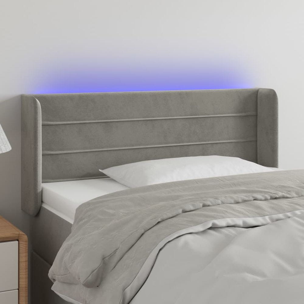 Vidaxl Čelo postele s LED bledosivé 83x16x78/88 cm zamat