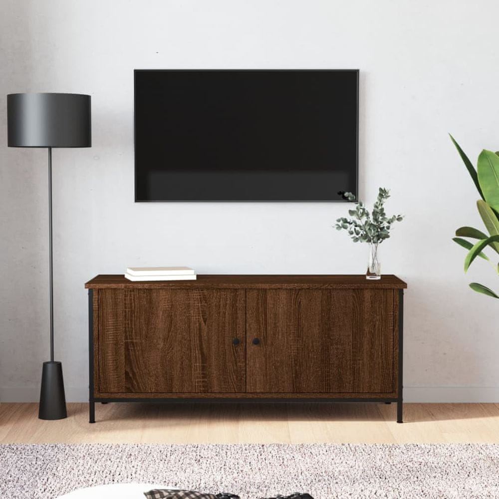 Vidaxl TV skrinka s dvierkami hnedý dub 102x35x45 cm kompozitné drevo