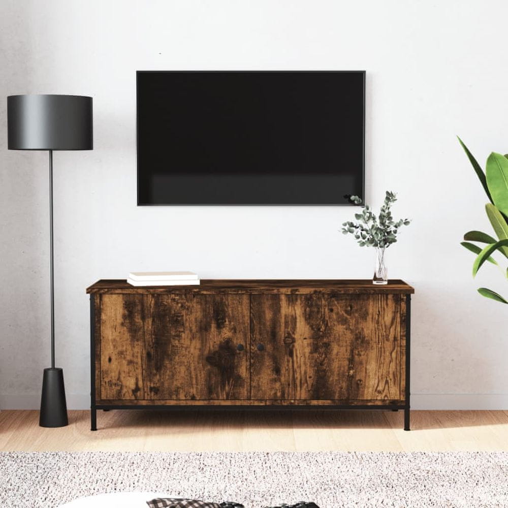 Vidaxl TV skrinka s dvierkami dymový dub 102x35x45 cm kompozitné drevo