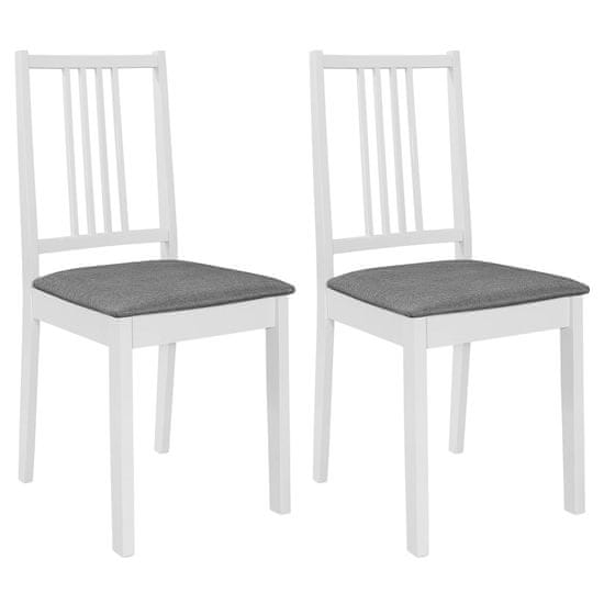 Vidaxl Jedálenské stoličky s podložkami 2 ks, biele, drevený masív