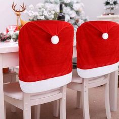 Mormark Vianočné návleky na jedálenské stoličky mikulášske čiapky (4ks) | SANTASEAT