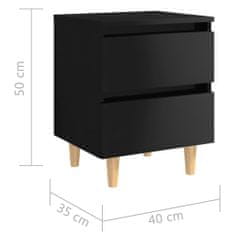Vidaxl Nočný stolík s nohami z masívneho borovicového dreva vysokolesklý čierny 40x35x50 cm