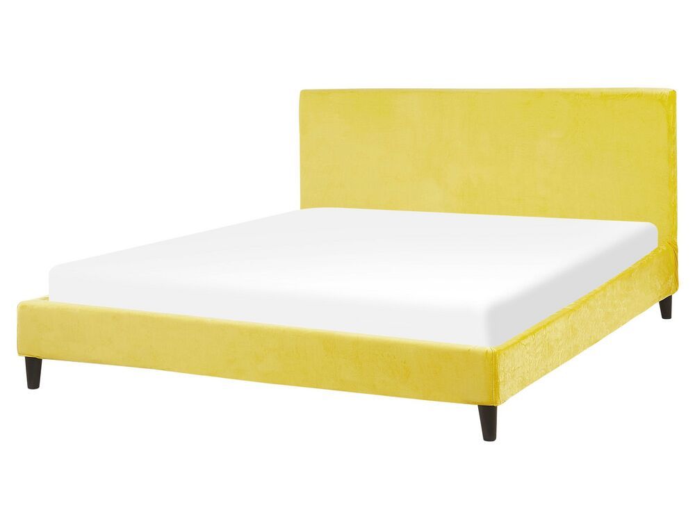 Beliani Čalúnená zamatová posteľ žltá 160 x 200 cm FITOU