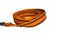 Palkar Vodítko z popruhu pre psov 150 cm x 25 mm oranžová s páskami