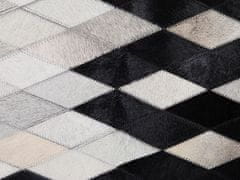 Beliani Kožený koberec 160 x 230 cm čiernobiely MALDAN