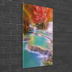Wallmuralia.sk Vertikálny foto obraz akrylový Vodopád jeseň 50x125 cm 2 prívesky
